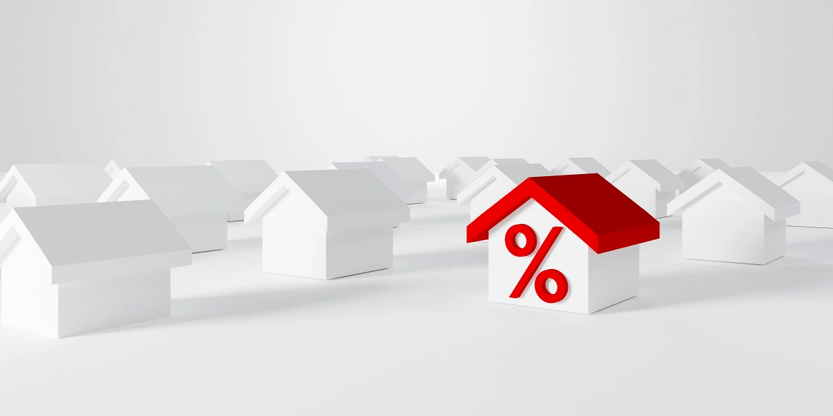 Requisitos generales del Crédito Infonavit: Casas blancas miniatura y casa con techo rojo